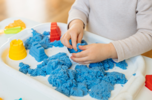 Child playing with sand